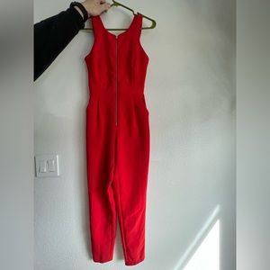 Bebe red jumpsuit size 0